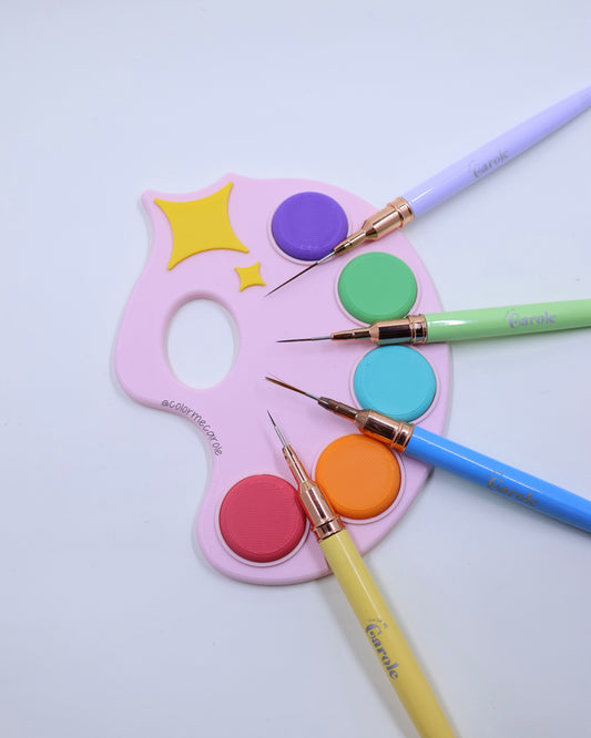 Colorful paint palette with paintbrushes