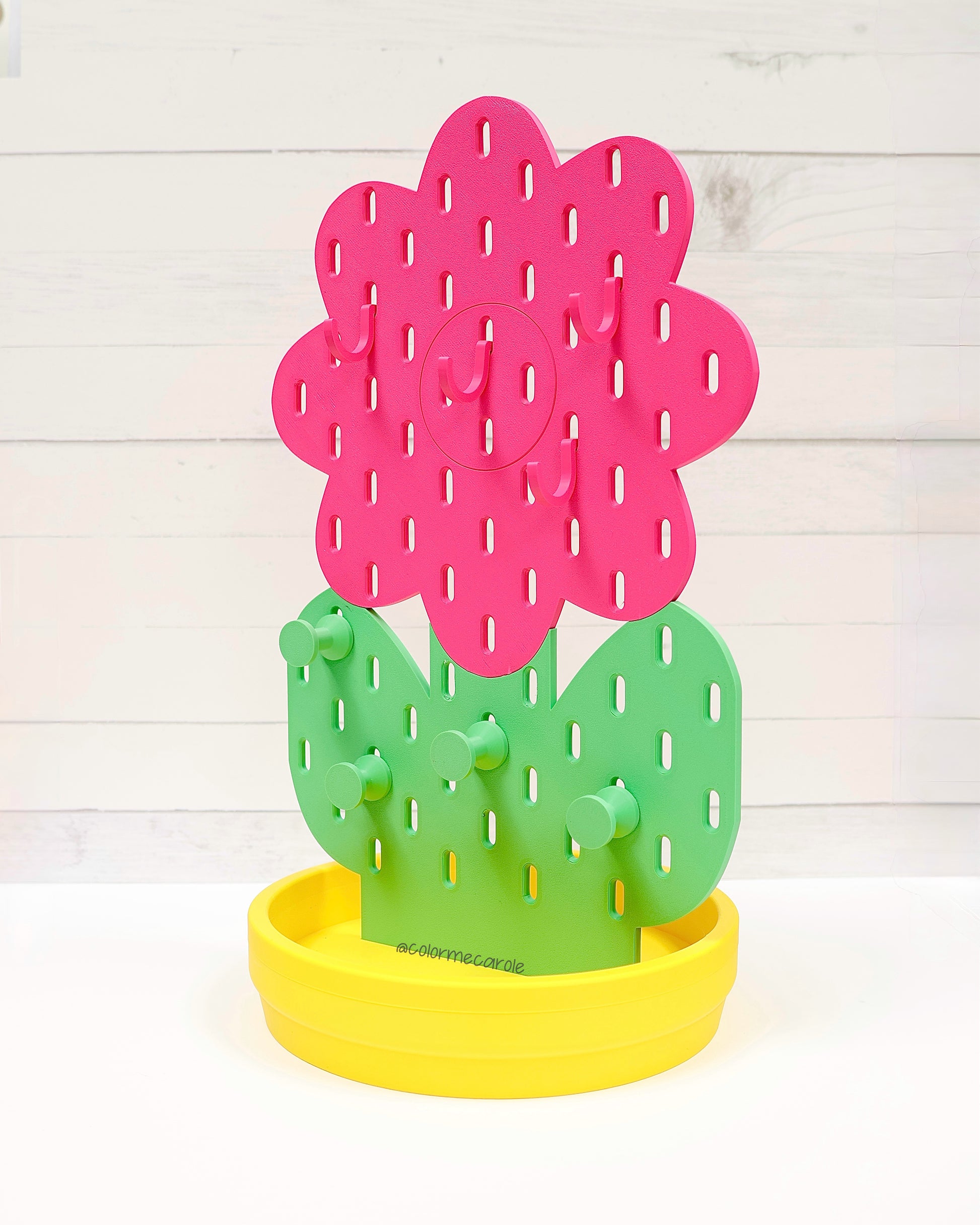 Colorful plastic flower-shaped pegboard display 